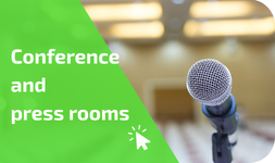 Pinanson banner with a microphone in a conference and press room